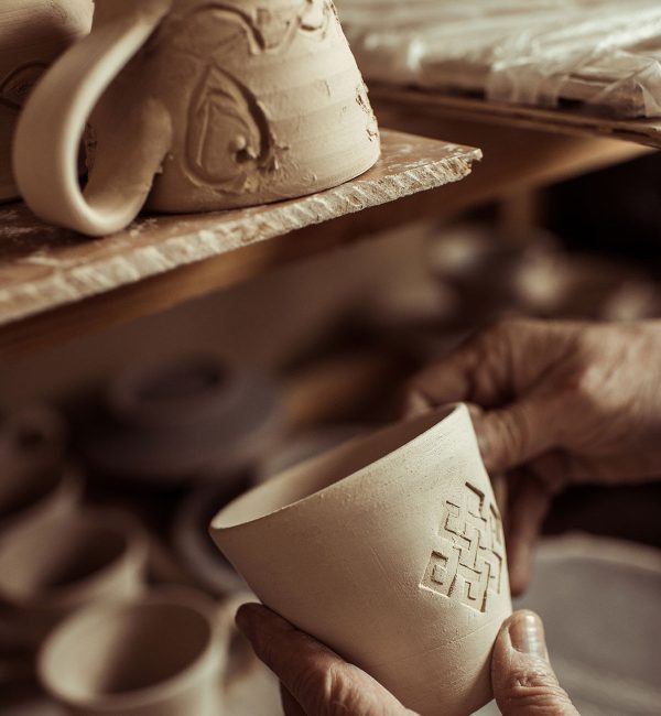 close-up-of-male-hand-of-potter-examining-clay-cup-resize.jpg close-up-of-male-hand-of-potter-examining-clay-cup-resize.jpg